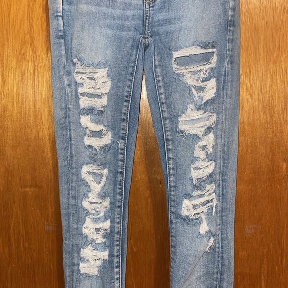 •AMERICAN EAGLE OUTFITTERS•LIGHT WASH NEXT LEVEL SUPER HI-RISE JEGGING SIZE 2 - Picture 3 of 7